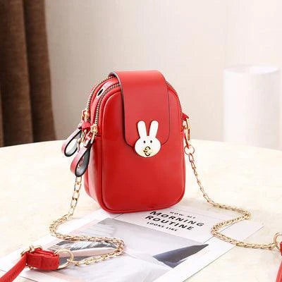 Charming mini bag with elegant British-inspired design, crafted from premium PU leather and featuring a secure zipper closure