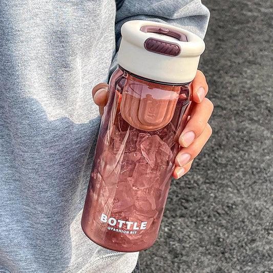 Minimalist modern sports water bottle with tea infuser compartment, in pink colour