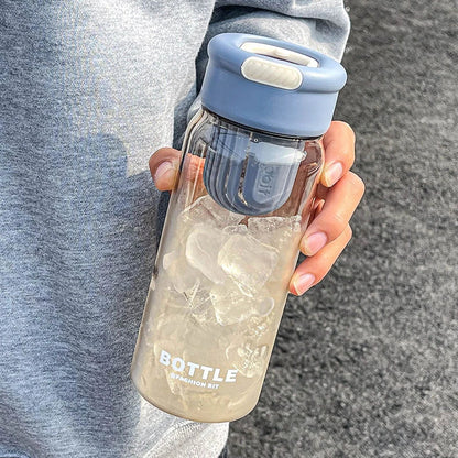 Minimalist modern sports water bottle with tea infuser compartment, in pink colour
