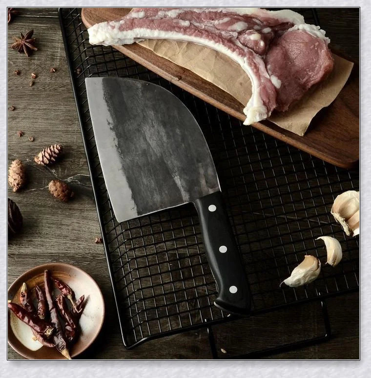 Hand-forged Serbian Butcher Knife with high-carbon steel blade, perfect for chopping, slicing, and hacking through vegetables, meats, and even wood.