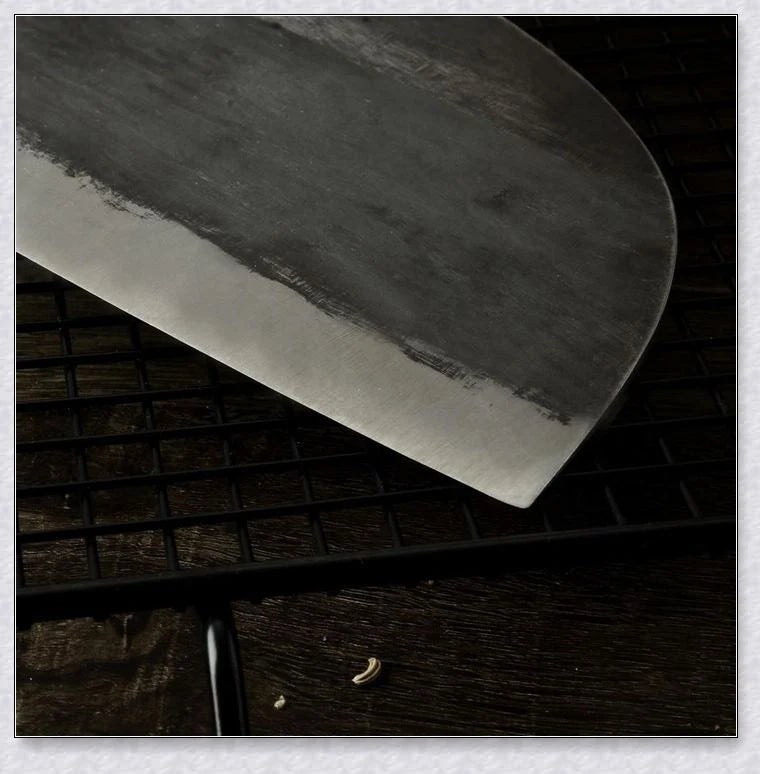 Hand-forged Serbian Butcher Knife with high-carbon steel blade, perfect for chopping, slicing, and hacking through vegetables, meats, and even wood.