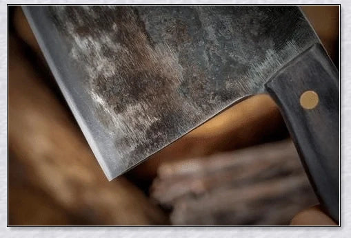 Hand-forged Serbian Butcher Knife with high-carbon steel blade, perfect for chopping, slicing, and hacking through vegetables, meats, and even wood.