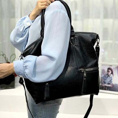 A stylish and spacious leather shoulder messenger bag in a variety of colours, featuring high-quality British craftsmanship