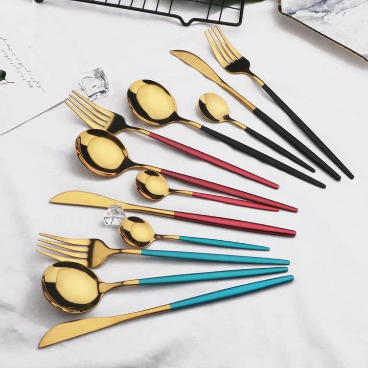 Vibrant stainless steel tableware set with colourful utensils including forks, knives, spoons, and teaspoons