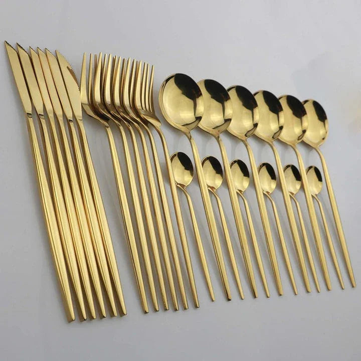 Vibrant stainless steel tableware set with colourful utensils including forks, knives, spoons, and teaspoons