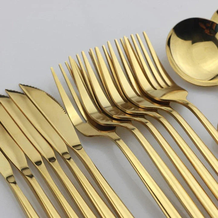 Vibrant stainless steel tableware set with colourful utensils including forks, knives, spoons, and teaspoons