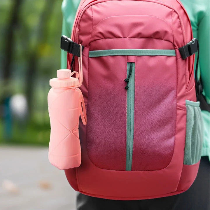 Folding silicone water bottle in various colours, perfect for outdoor activities like hiking, camping, and cycling