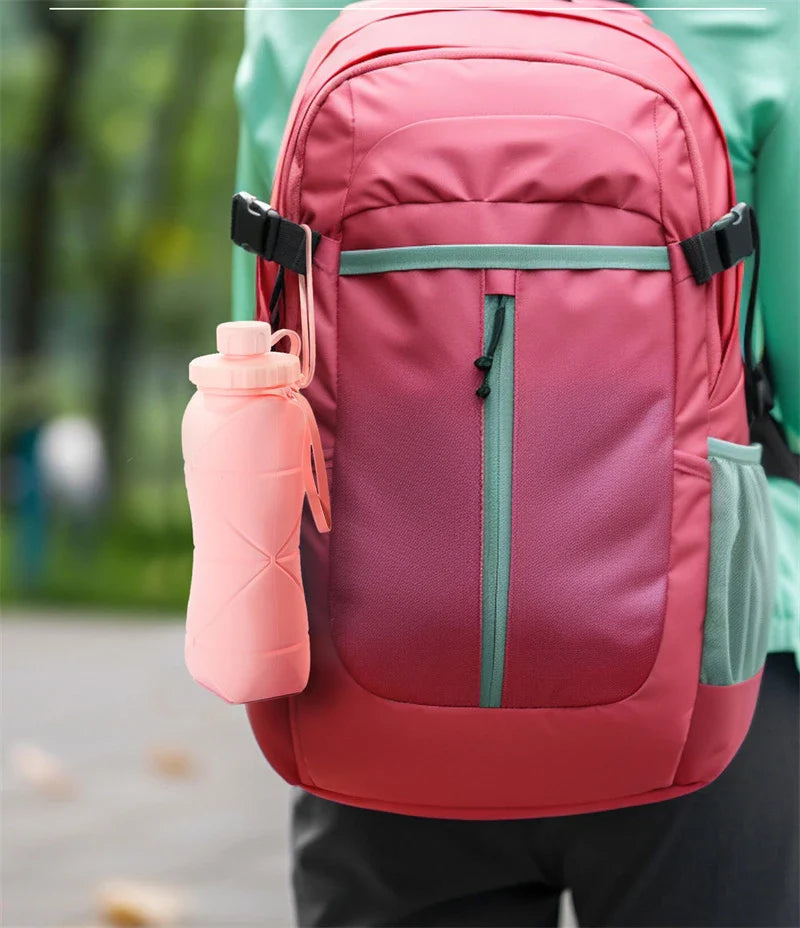 Folding silicone water bottle in various colours, perfect for outdoor activities like hiking, camping, and cycling