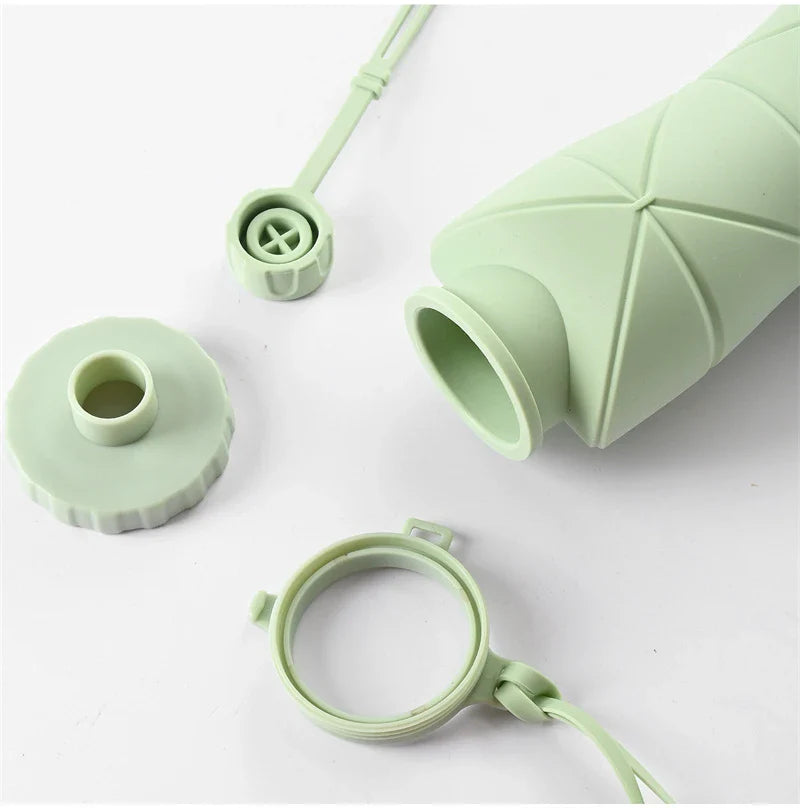 Folding silicone water bottle in various colours, perfect for outdoor activities like hiking, camping, and cycling