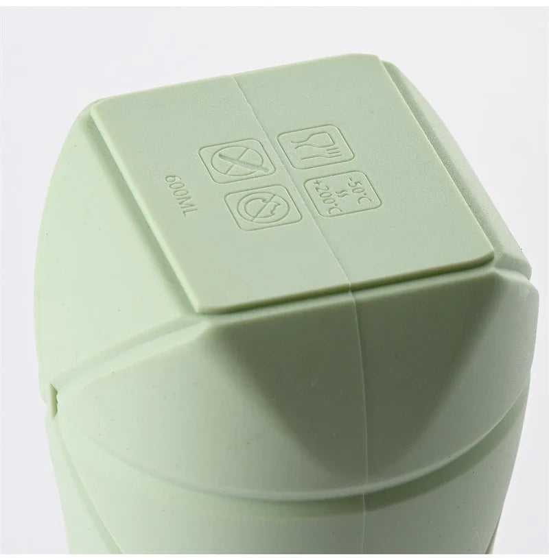 Folding silicone water bottle in various colours, perfect for outdoor activities like hiking, camping, and cycling