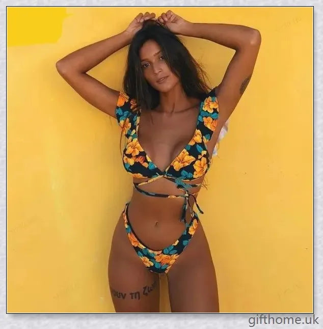 A premium polyester swimsuit with a brief, wavy design and gradient stripes for a chic, on-trend beach look