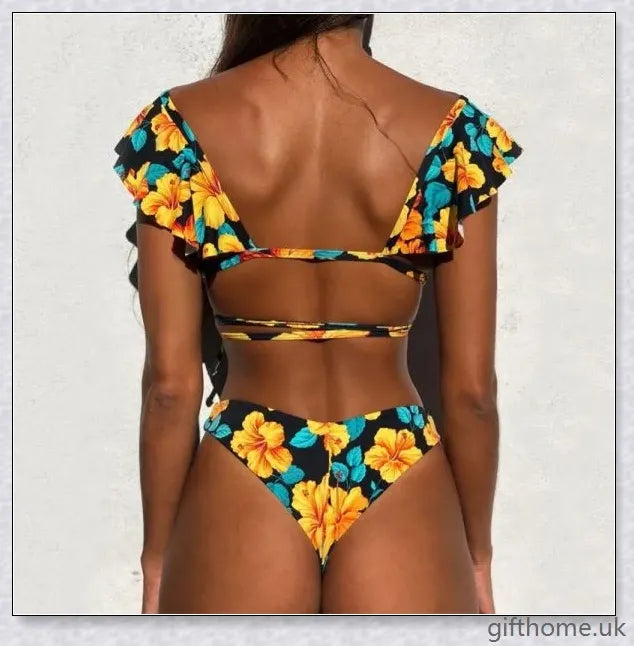 A premium polyester swimsuit with a brief, wavy design and gradient stripes for a chic, on-trend beach look