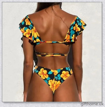 A premium polyester swimsuit with a brief, wavy design and gradient stripes for a chic, on-trend beach look