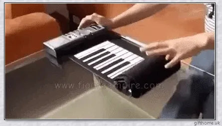 Portable electric piano with 88 or 61 keys, high-quality sound, and a compact, rollup design for easy transport