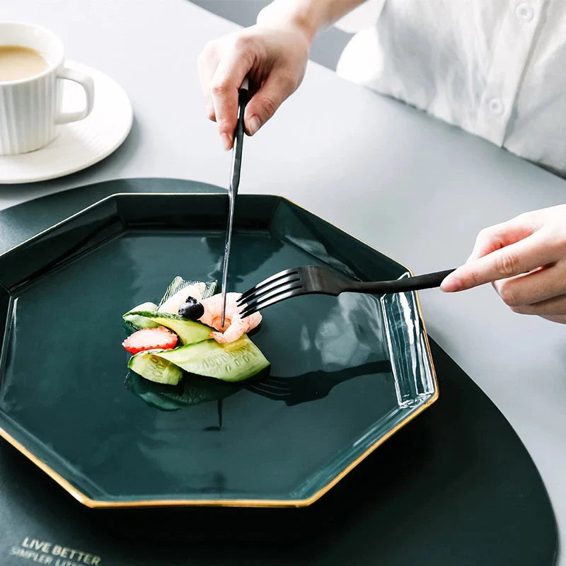 Elegant Nordic Stainless Steel Cutlery Set with a sleek black and white design, including knife, fork, spoon, and chopsticks