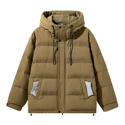 A cosy, black 90% white duck down jacket with a streamlined, modern design, perfect for navigating the ever-changing British weather.