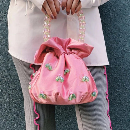 Handmade glass crystal beaded handbag in a chic floral pattern, perfect for formal events and everyday style