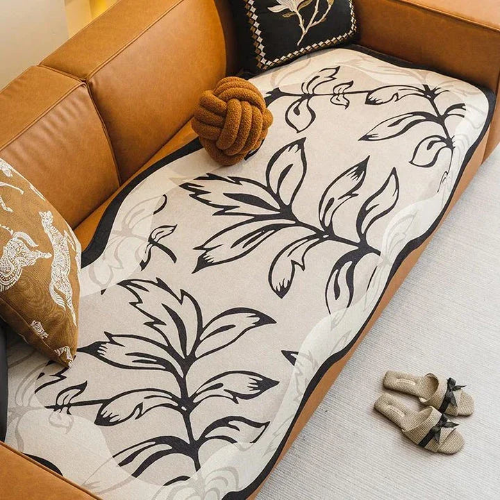 Elegant jacquard leaves pattern sofa cover with anti-slip design for versatile fit and easy maintenance