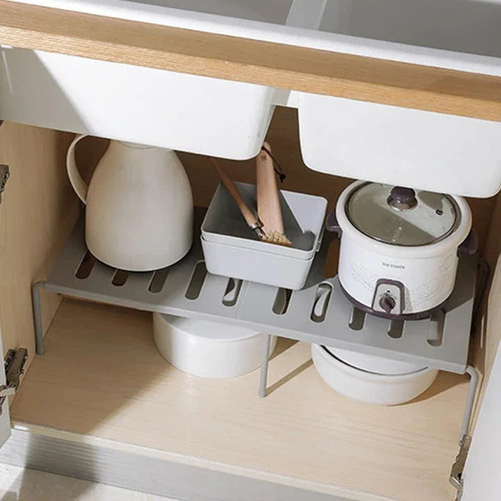 Premium white kitchen storage shelf with a modern and sleek design, providing ample storage space for kitchen essentials.