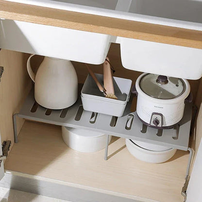 Premium white kitchen storage shelf with a modern and sleek design, providing ample storage space for kitchen essentials.