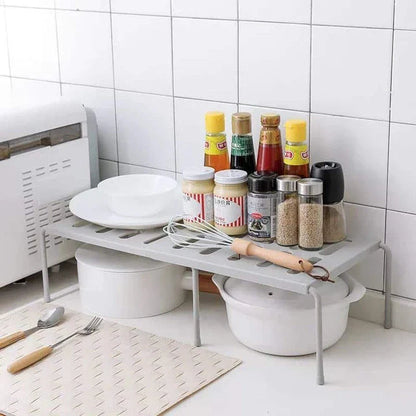 Premium white kitchen storage shelf with a modern and sleek design, providing ample storage space for kitchen essentials.