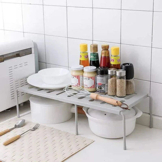 Premium white kitchen storage shelf with a modern and sleek design, providing ample storage space for kitchen essentials.