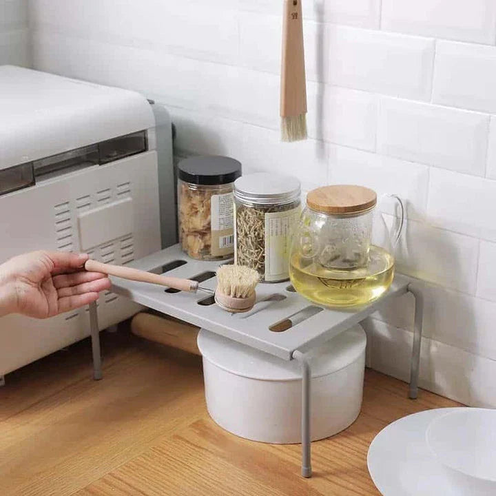 Premium white kitchen storage shelf with a modern and sleek design, providing ample storage space for kitchen essentials.
