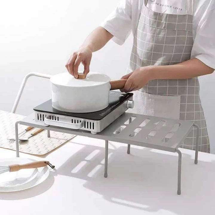 Premium white kitchen storage shelf with a modern and sleek design, providing ample storage space for kitchen essentials.