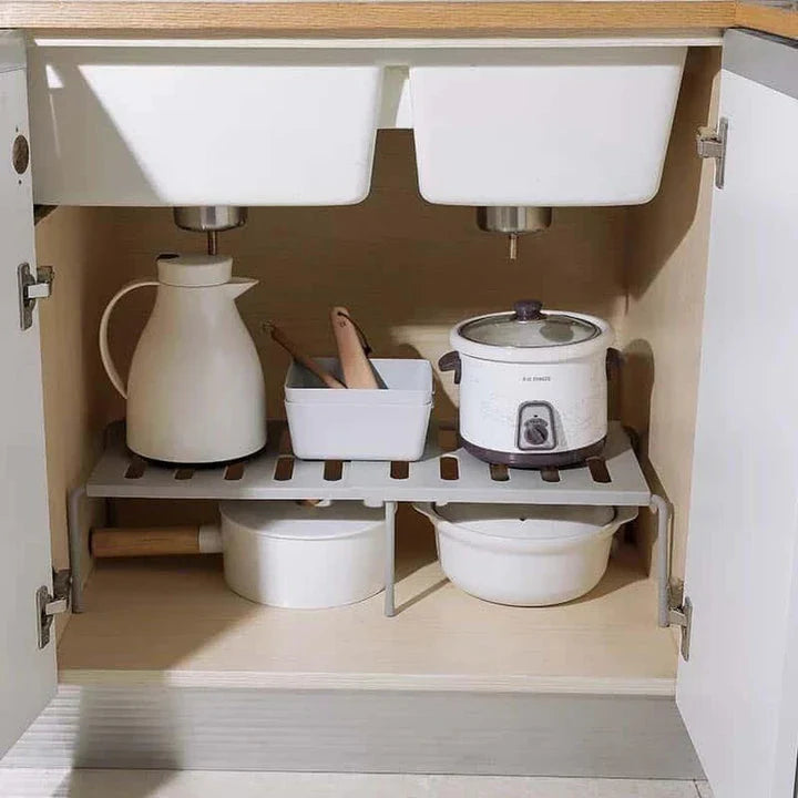 Premium white kitchen storage shelf with a modern and sleek design, providing ample storage space for kitchen essentials.