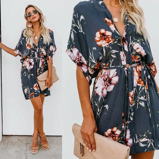 Stylish printed v-neck dress in apricot color, featuring a flattering silhouette and premium materials for a timeless, elegant look.