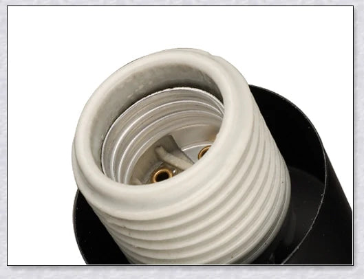 A modern, black and white wireless wall lamp with a fabric shade, providing elegant lighting for a living room or bedroom.