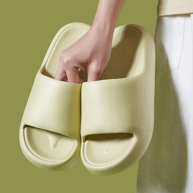 Comfortable EVA foam slip-on slippers in various colors, featuring non-slip soles and a breathable design for indoor and bathroom use.