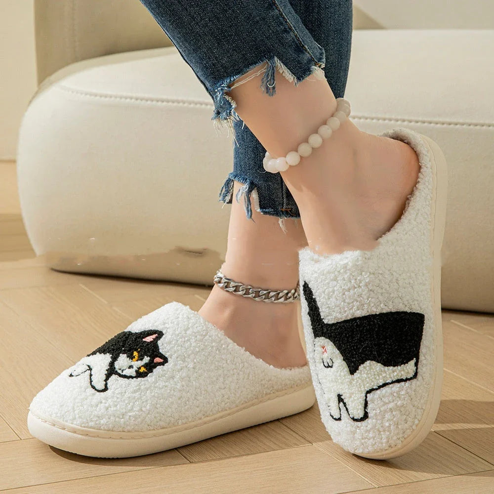 Cozy cartoon slippers with soft, plush interior and durable non-slip soles for indoor and outdoor wear