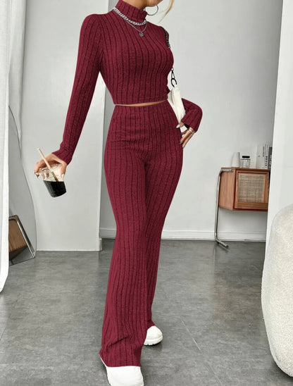 Elegant cotton turtleneck and wide-leg trousers suit in various colours, including bean green, light gray, dark red, and sapphire blue.