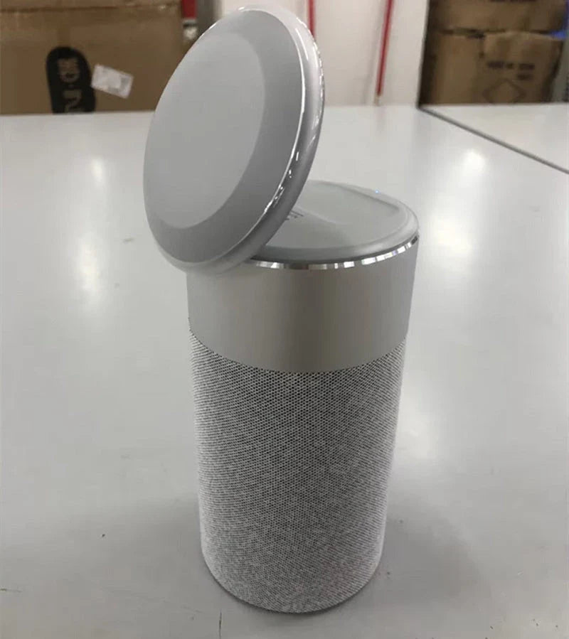 A 3-in-1 device that combines a wireless charger, Bluetooth speaker, and touch-controlled lamp for versatile functionality in the home or office.