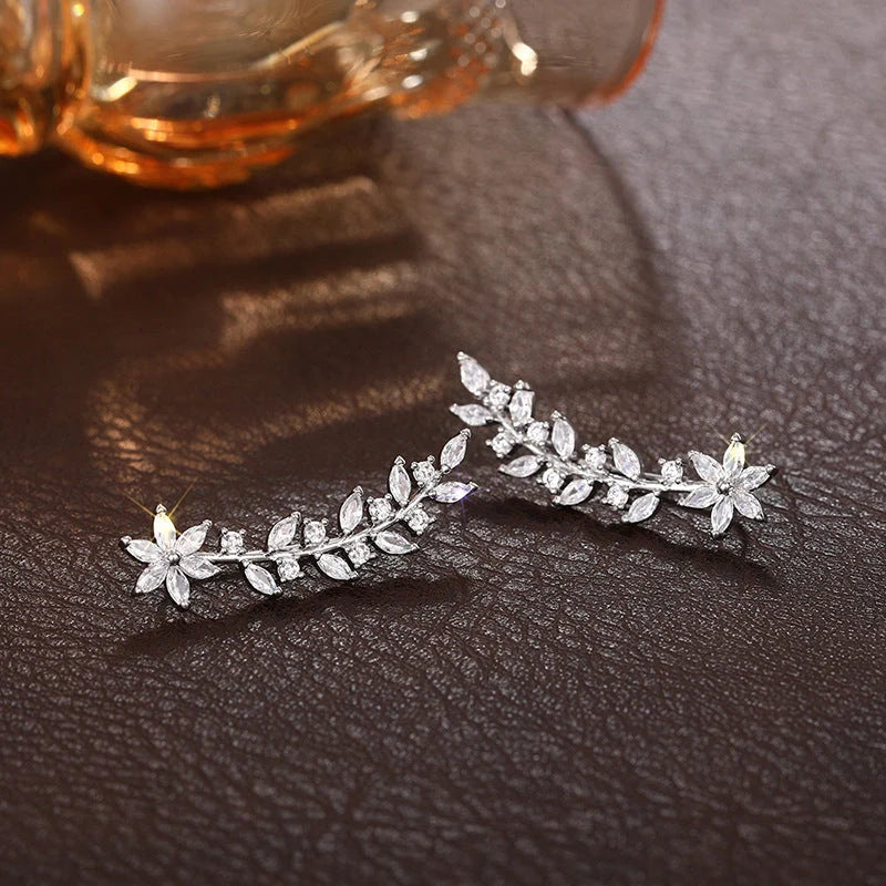 Stylish diamond flower earrings for women in white gold, gold, and rose gold
