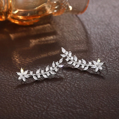 Stylish diamond flower earrings for women in white gold, gold, and rose gold