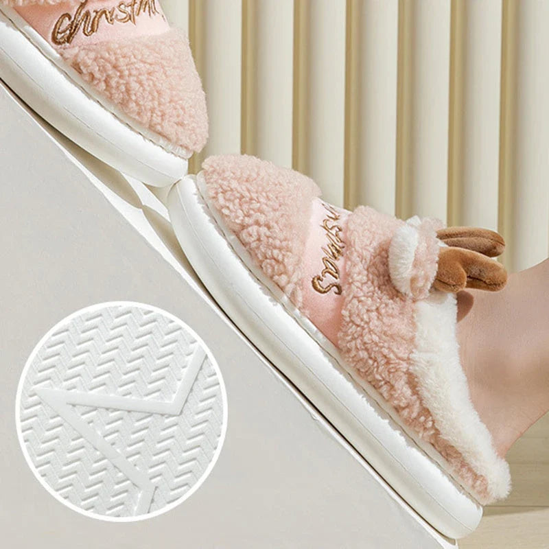 Cozy elk-themed slippers in a variety of festive colors, featuring a plush suede upper and supportive EVA sole for maximum comfort and warmth.