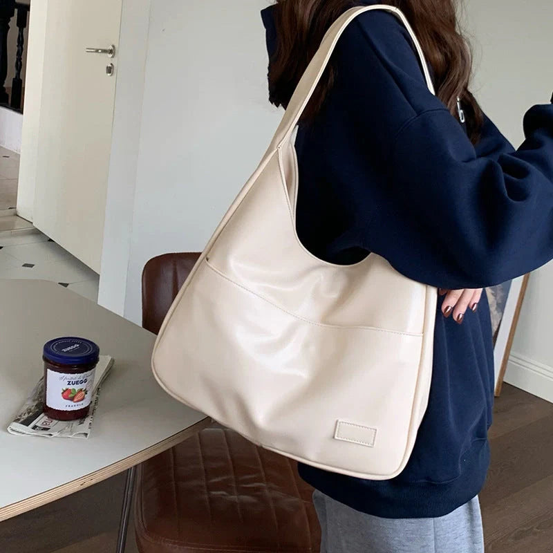 Spacious Women's Tote Bag in Brown, Black, and White Colours with Comfortable Shoulder Straps