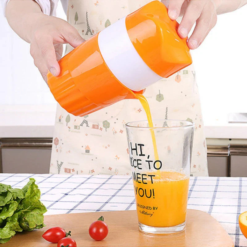 Premium manual citrus juicer with 300ml capacity, made of durable plastic and available in orange and pink colours