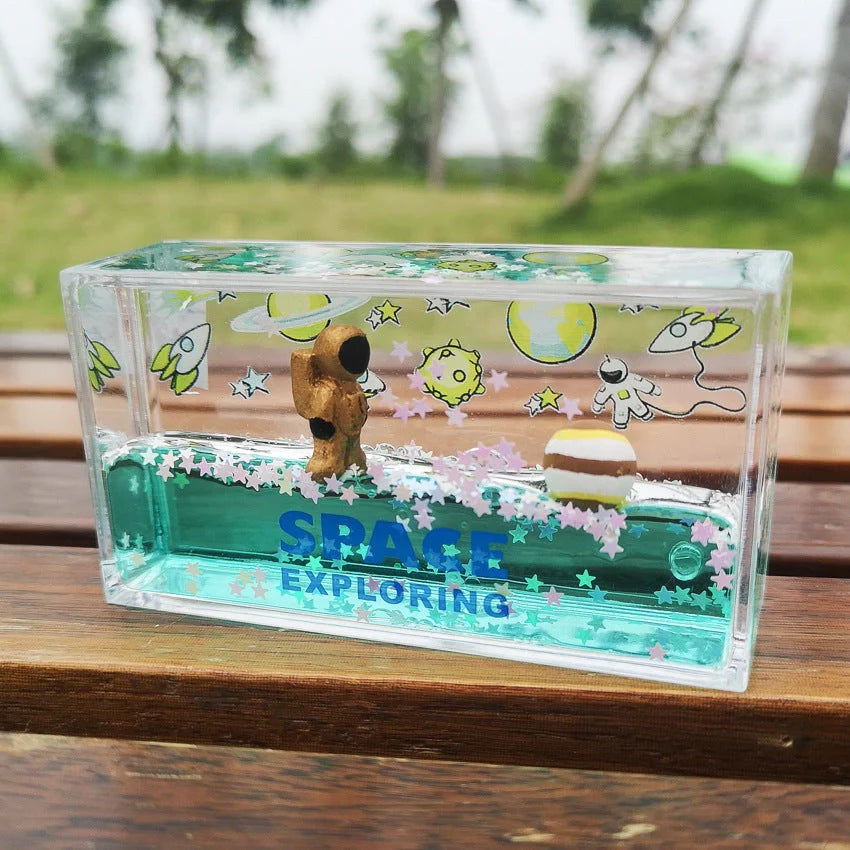Acrylic liquid quicksand floating astronaut ornament in various colours