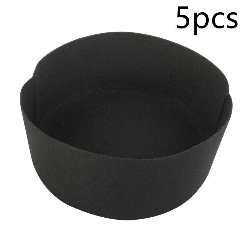 Round black and green fabric grow bags for garden plants with automatic drainage