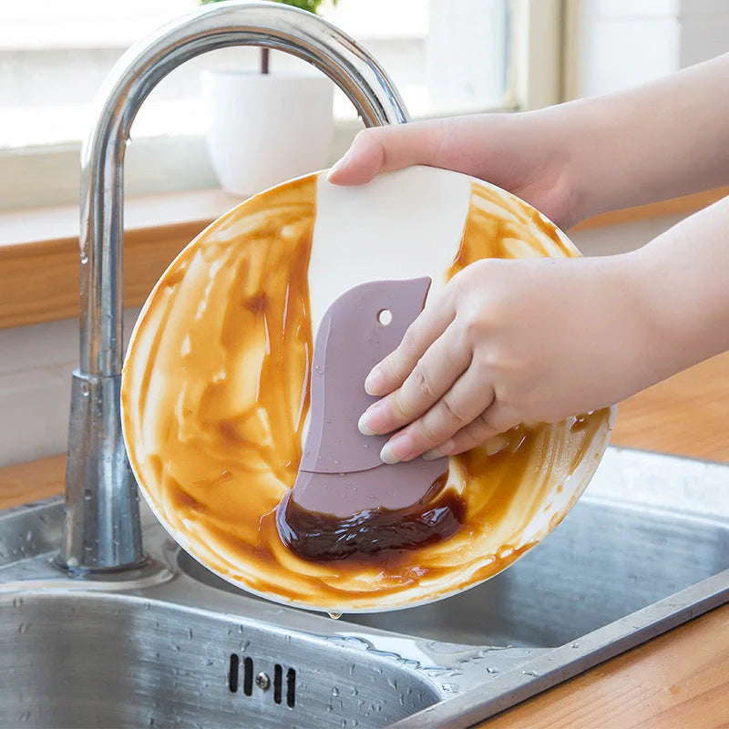 Penguin-shaped soft blade kitchen scraper for efficient cleaning