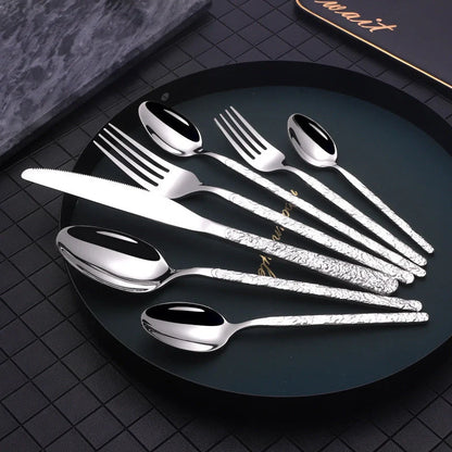 Premium steak cutlery set with embossed textured handles, made of durable stainless steel for a refined dining experience.