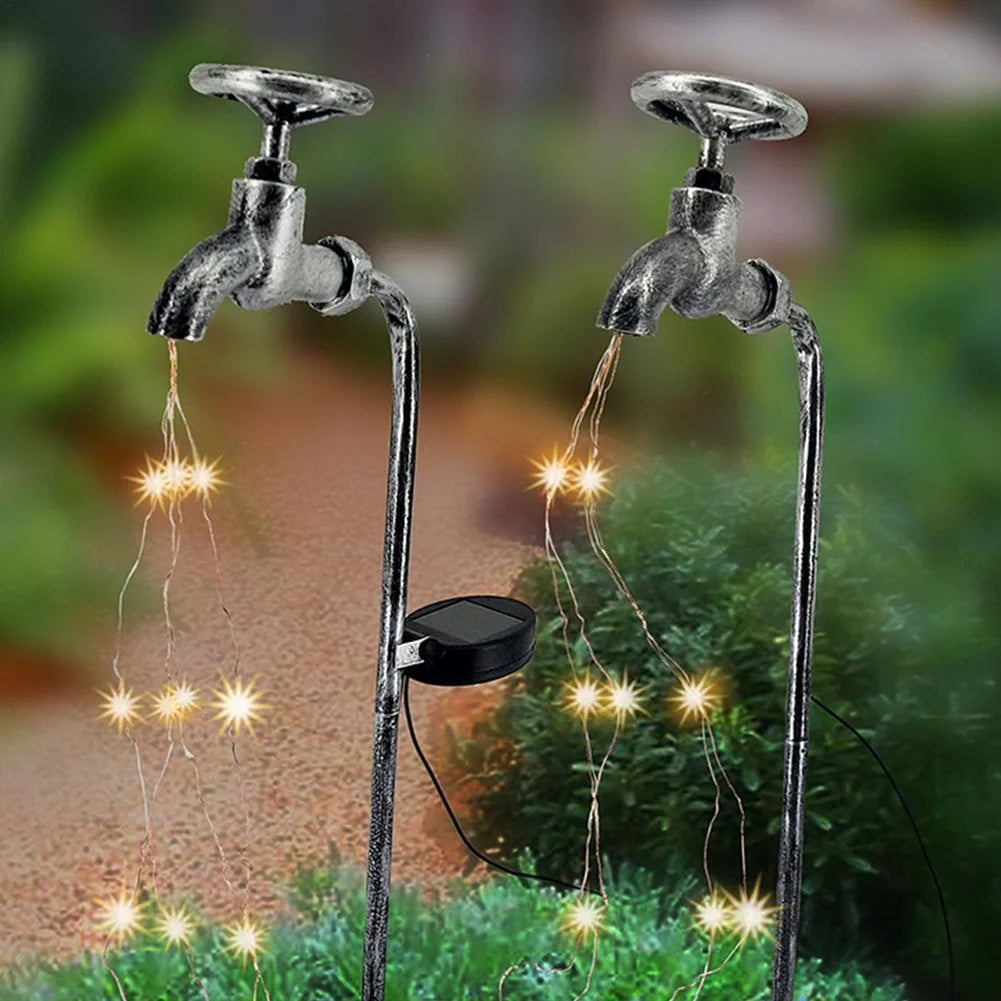 Solar-powered garden lamp with water faucet design for outdoor decoration