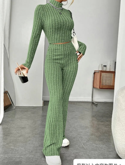 Elegant cotton turtleneck and wide-leg trousers suit in various colours, including bean green, light gray, dark red, and sapphire blue.