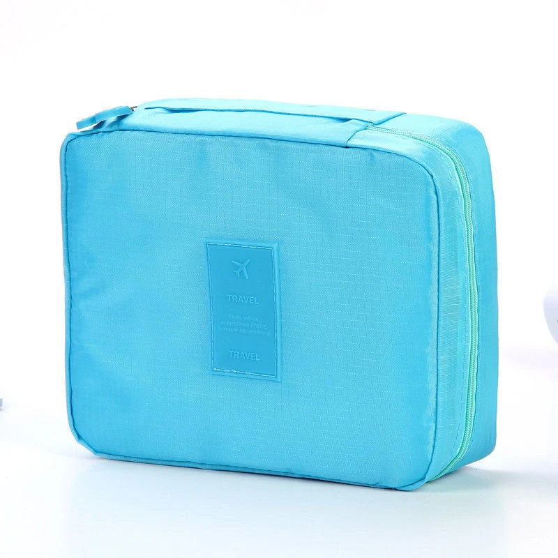 Premium toiletry bag with waterproof divider, multi-grid pockets, and durable Oxford cloth construction