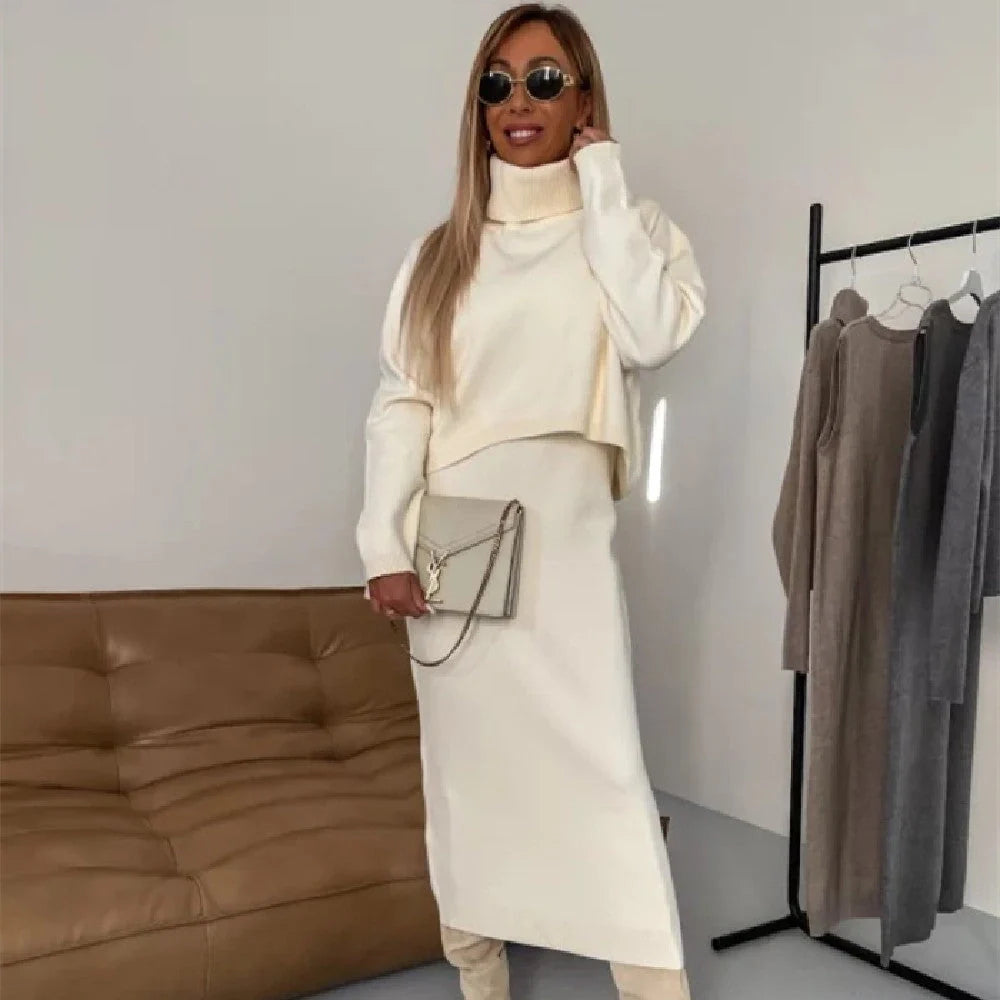 Women's winter turtleneck pullover and sleeveless long dress set in white, grey, and camel