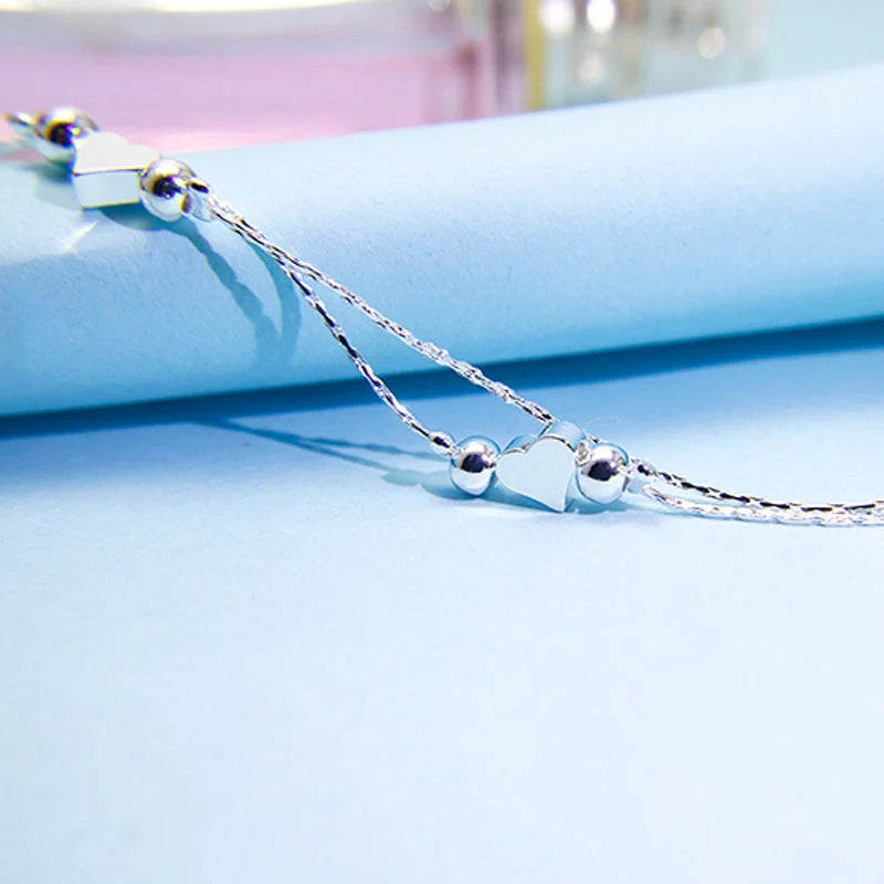 Korean fashion double-layered heart bracelet with light beads in white gold, gold, and rose gold options