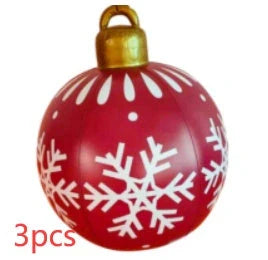 Vibrant inflatable Christmas baubles in a variety of colours and patterns, perfect for outdoor holiday decoration